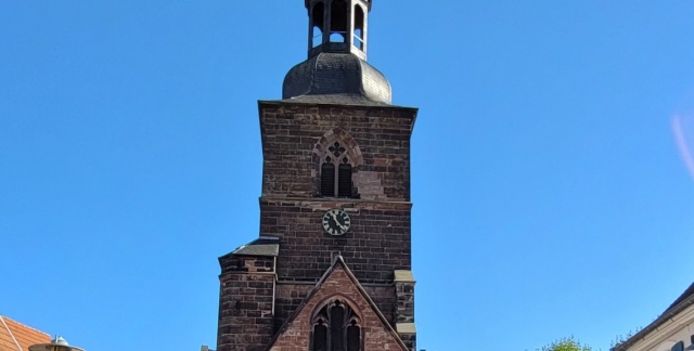 Collegiate Church of St Arnual  ouside with blue skies
